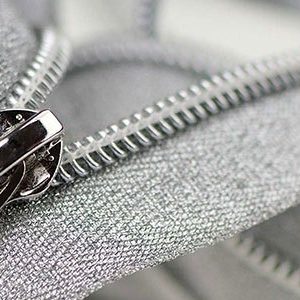 What is the Difference Between Invisible Zippers and Regular Zippers for Dressmaking